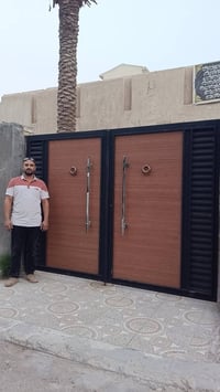 معمل حداده علي محسن سمين لعمل الابواب والشبابيك  والمحجرات 07811784447