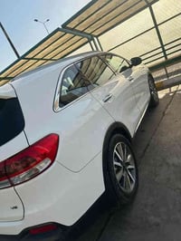 كيا سورنتو خليجي  رقم بغداد انكليزي بسمي  موديل 2016 شكل ال٢٠ لون ابيض...