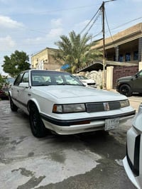 سيارة اولدز موديل 1990 مكينة 3100 بغداد بسمي صبغ عبايه بسبب الجراد بني...