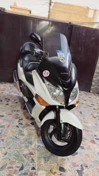 سلام وعليكم دراجه جيتي محرك 400 رقم تحويل ثاني يوم ماشي 36 دراجه بل كا...