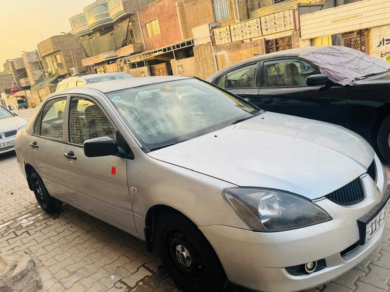 ‏لانسر للبيع 2006 بيع مستعجل باسمي تحويل ثاني يوم ما متواجد على الفيس مكانه بغداد مدينة شارع الفلاح ***********
