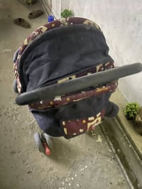 عربانة مستعملة • ملابس ولادي يوم-سنة • بغداد حي العامل