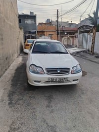 جيلي CK • مكينة وكير • رقم بابل