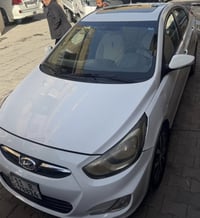 السلام وعليكم اكسنت موديل 2015 بيها باب وجاملغ ضربت تك تك وبيها تكحيل ...