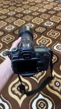 نيكون ٧١٠٠ • زوم رياضي • رمادي