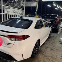 كورلا هايبرد شكل امريكي موديل 2024  فول    معروفه مواصفات  كشنات جلد ع...