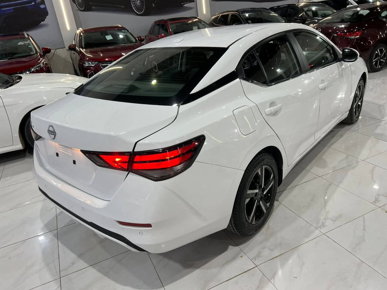 السلام عليكم
نيسان سنترا موديل : 2024

سعر117 ورقه بدون رقم ( تترقم شمالي )
حجم المحرك : 2.0L ( 4 سلندر )

صفحة تين صبغ 

المواصفات : 
‏‎بصمة ابواب 
‏‎بصمة تشغيل 
تشغيل عن بعد
‏‎شاشة كبير‏
اوتو هولد: Auto Hold
اوتو ستارد : Auto Stard 
رادار امامي (تحديد مسار)
‏‎رادار جانبي (نقاط عمياء)
‏‎رادار خلفي (التحذير من الاصطدام)
‏‎حساسات امامي
‏‎حساسات جانبي 
‏‎حساسات خلفي 
نظام : Eco - Normal - Sport
تحكيم ستيرين
ستيرين هيتر
تبريد مركزي
لايتات ليد وعدسة زينون 
بكلايتات LED
ويل كروم

 للاستفسار واتساب ☎️ ***********
***********

العنوان / اربيل شارع 100 ( معرض ولید كارس)
