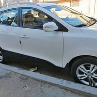 توسان ٢٠١٢ محرك دوش ٢٠٠٠ كير ومحرك بحالة جيدة رقم بغداد ألماني سنوية ب...