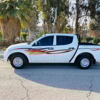 گؤرينه وه به شاهينه ساخ ميتسو بيشى/2009/L200/بى بؤياخ موزايده وه كا له...