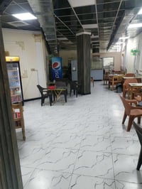 محل كبير تجاري للايجار او للبيع بعقد سر قفليه في كراده قرب رضا علوان م...