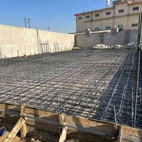 معمل عصائر ومياه • تلكيف الموصل • نصب أعمدة حديدية