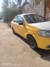 أفيو ٢٠٠٩ • ١٦٠٠ اتوماتيك • رقم بغداد