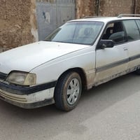 اوميكا استيشن حجم 20 رقم الماني سنوية اخضر كربون بنزين بيها محرك و كير...