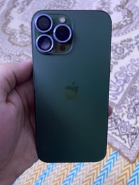 ايفون 13 برو ماكس 256زيتوني بطارية 85  مكفول كلشي ممبدل بي جهاز ع ايدي...