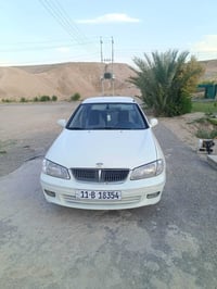 سياره سني ياباني اصلي موديل 2002 رقم بغداد دولي كير محرك قبق اسود المر...