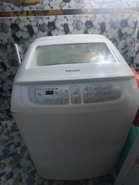 غسالة أوتوماتيكية شغاله ونظيفه سعرها 250 وبيها مجال التواصل 0780410530...
