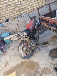 دراجة نارية • اسود • نجف شارع المطار