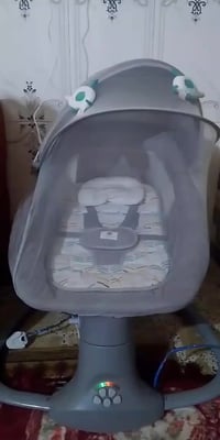 كرسي هزاز كهربائي • اطفال • خدمة توصيل