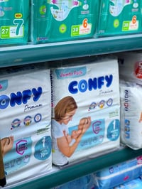 حفاظات كونفي بريميوم • مقاس ١-٧ • امتصاص سريع