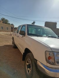 نيسان مديل 2000للبيع مكفوله م̷ـــِْن الضربه رقم نجف تبريد ثلج مكينه بي...