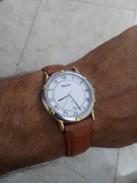 ساعة كوارتز • صنع فرنسي • قطر ٣٦مم