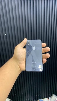 قطعتين ايفون اكس عادي فحم   بطاريات وكامرات شغالة  يفيد اهل تفصيخ   سع...