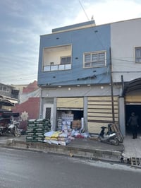 شبه تجاري • محلين ١١٢م • شقة ١٢٢م ٢نوم