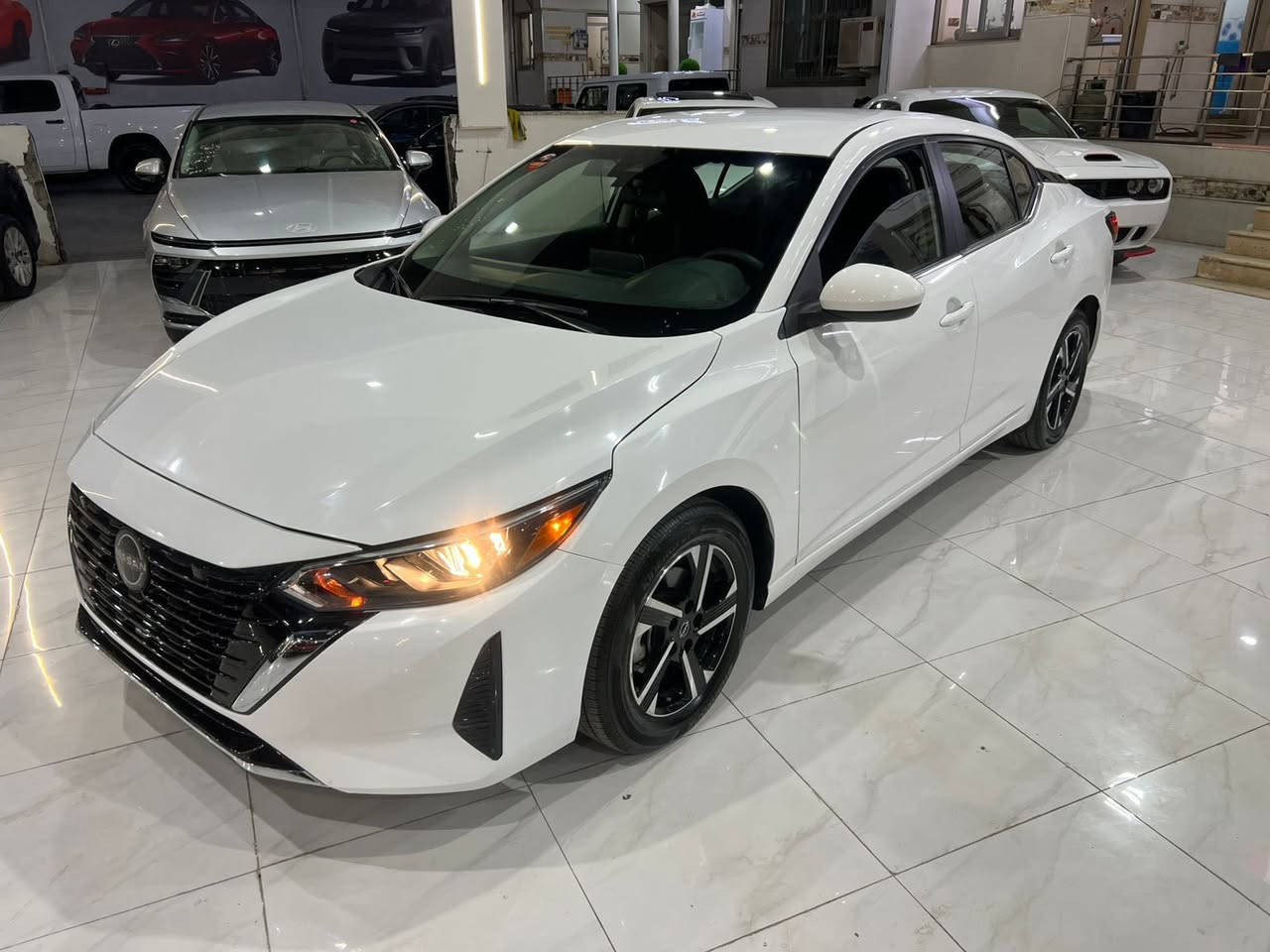 السلام عليكم
نيسان سنترا موديل : 2024

سعر117 ورقه بدون رقم ( تترقم شمالي )
حجم المحرك : 2.0L ( 4 سلندر )

صفحة تين صبغ 

المواصفات : 
‏‎بصمة ابواب 
‏‎بصمة تشغيل 
تشغيل عن بعد
‏‎شاشة كبير‏
اوتو هولد: Auto Hold
اوتو ستارد : Auto Stard 
رادار امامي (تحديد مسار)
‏‎رادار جانبي (نقاط عمياء)
‏‎رادار خلفي (التحذير من الاصطدام)
‏‎حساسات امامي
‏‎حساسات جانبي 
‏‎حساسات خلفي 
نظام : Eco - Normal - Sport
تحكيم ستيرين
ستيرين هيتر
تبريد مركزي
لايتات ليد وعدسة زينون 
بكلايتات LED
ويل كروم

 للاستفسار واتساب ☎️ ***********
***********

العنوان / اربيل شارع 100 ( معرض ولید كارس)
