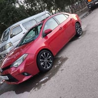 سيارة كورلا موديل 2014  وارد امريكي السيارة حادثها جاملغ وباب بدون دوا...