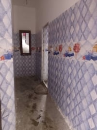 بيت للبيع مساحه خمسميه المكان ولدايه قرب جسر الفرنسي يم مدينه الالعاب....