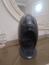 ماكنة قهوة • كبسولات • دولتشي غوستو