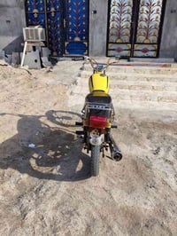 دراجة نارية • مكفولة • كرمة علي