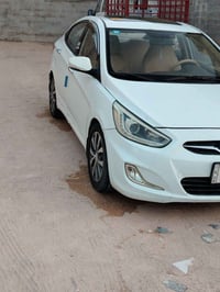 اكسنت • ٢٠١٤ • رقم بصره دولي