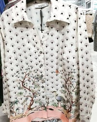 قميص • ملابس