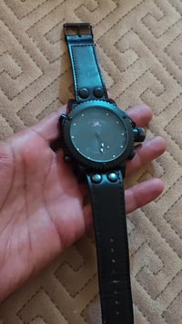 ساعة • معطلة • بطارية