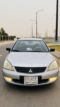 لانسر ٢٠١٠ • محرك ١٥٠٠ • بدون صبغ