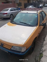 سيارة بيجو روى بيع موديل 2009هذا  رقم الموبايل 07738168496