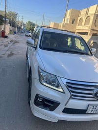 لكزس 2012.         السعر 355 وبيها مجال رقم بغداد.                 مكف...