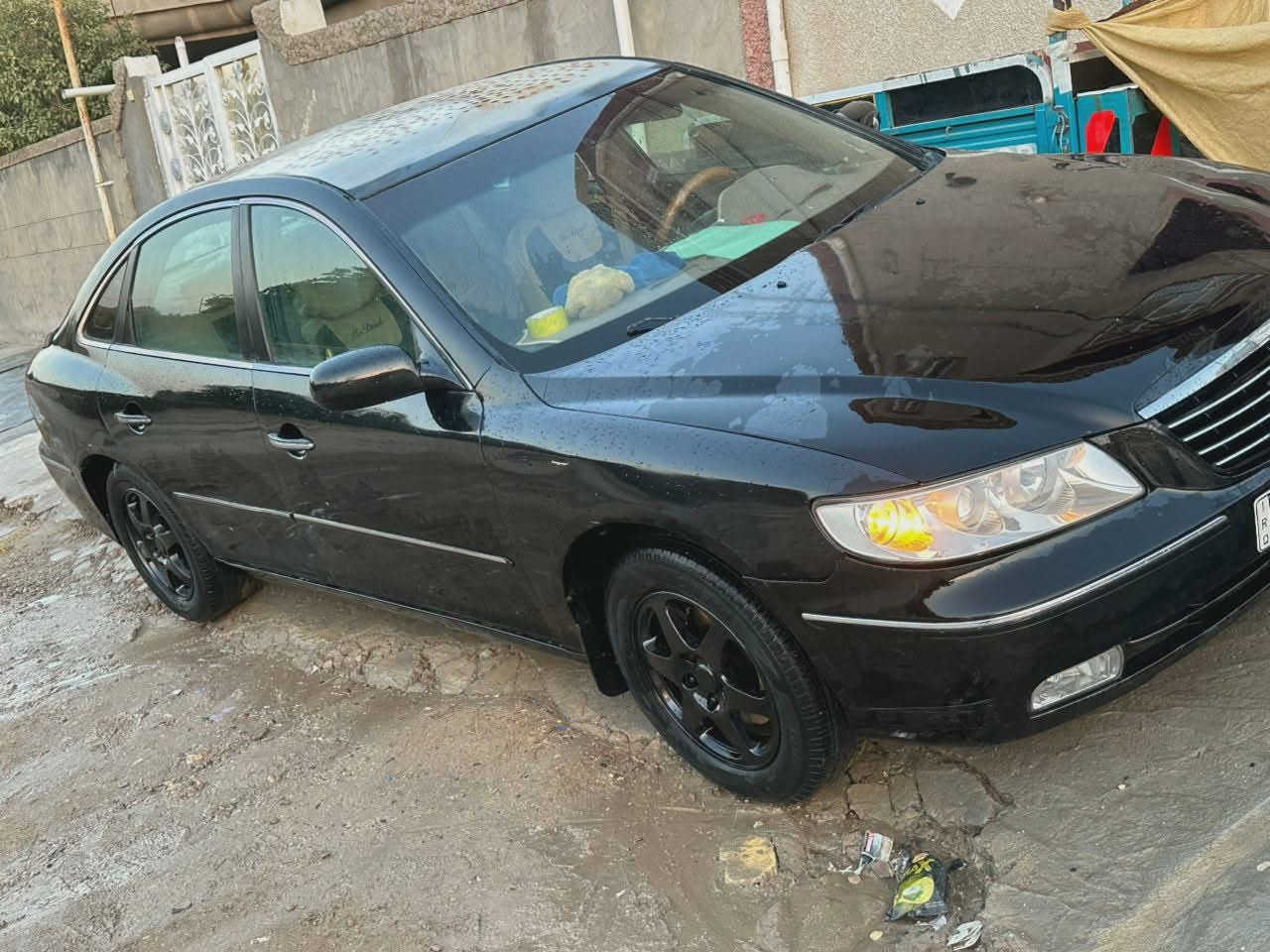 السلام عليكم ورحمة الله وبركاته اخواني الاعزاء للبيع او مراوس هونداي ازيرا موديل2007 وارد امريكي رىقم بغداد دولي تحويل مباشر  السياره كير ميكينه كارتون منظومة تبريد جديده حداديه اماامي خلفي نضيف وخير من الله سياره شاشه كامره كشنات كهرباء مري كهرباء  سيارة مصبوغة عام ضربته من أمريكا جاملغ امامي ايسر وبالعراق ايضا جاملغي خلفي ايسر سياره سعر سياره63وبيه مجال للطيبين وماكو هيج سعر بس كون السياره يحتاجله ترتيبات  بسيطه *********** مكاني بابل مركز مدينه

