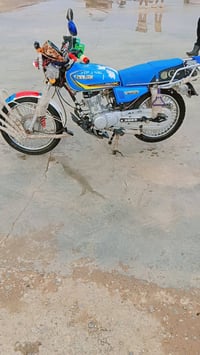 دراجة نارية • موديل ٢٣ • معدل كهربائيات