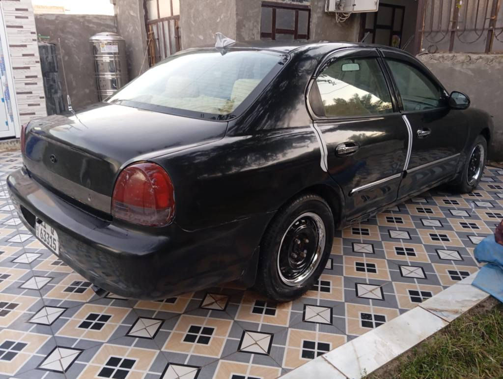 هونداي سوناتا موديل ٢٠٠٠ وأرد امريكي رقم بغداد دولي سنويه وهزه جديده مكينه ٤ سلندر جديده كير جديد حداديه امامي وخلفي جديد. صبغ عام بدون حادث قوي. داخل كلش حلو كهربائيات كله شغاله . شاشه وكامره خلفيه وحساسات. تايرات نضاف .. سياره جاهزه ترايه ناعم جداً. تبريد منضومه كله شغاله بس غاز . سنتر لوك شغال . . مكانه بابل قضاء القاسم 
*********** 
سعره 48وبيه مجال قليل حلة, بابل
