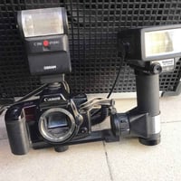 كاميرا مع افلاشين لبيع بدون عدسه توصيل موجود 07711011751