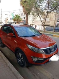 سبورتج للبيع موديل ٢٠١٤  سلوفاكي .. اللون مشمشي .. رقم بغداد انكليزي ....