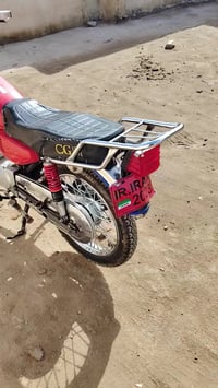 دراجة • مكفولة • ما مفتوحة