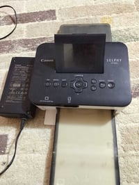 طابعه كانون الاصليه هي وحبرها واوراقها كامله اي صوره عندك بالتليفون تس...