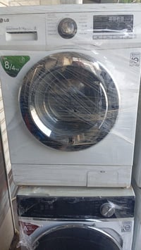 غساله الجي 8كيلو للبيع سعرها 200حته بيها نضام تبخير تيبس الملابس للااس...