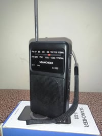 راديو صيني • موجتين FM AM • بطاريتين قلم