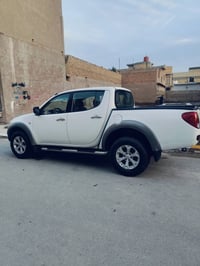 ميتسوبيشي L200 • مكفولة • كفالة عامة