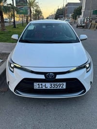 كورلا موديل 24 هايبرد فول 1/1 داخل احمر السياره ماشيه 18الف بعدها ع وض...