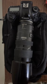 انون 5DlV وعدسة70-200تامرون للبيع 07778041651